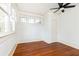 Spacious bedroom with hardwood floors and ceiling fan at 1252 Mclendon Ne Ave, Atlanta, GA 30307