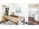 Bright dining room with hardwood floors and a view into the kitchen at 1252 Mclendon Ne Ave, Atlanta, GA 30307