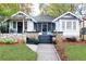 Front view of a charming house with porch at 1252 Mclendon Ne Ave, Atlanta, GA 30307