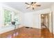 Spacious living room with hardwood floors and large windows at 1252 Mclendon Ne Ave, Atlanta, GA 30307