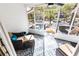 Relaxing screened porch with outdoor seating and rug at 1252 Mclendon Ne Ave, Atlanta, GA 30307