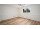 Well-lit bedroom, featuring hardwood floors and wainscoting at 2088 E Cherokee Dr, Woodstock, GA 30188