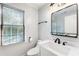 Clean bathroom with white vanity and subway tile at 315 Brandenburgh Cir, Roswell, GA 30075