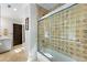 Bathroom with a shower/tub combo and tiled walls at 315 Brandenburgh Cir, Roswell, GA 30075