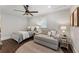 Charming bedroom with a queen bed and sitting area at 315 Brandenburgh Cir, Roswell, GA 30075