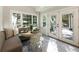 Sunlit breakfast nook with French doors leading to deck at 315 Brandenburgh Cir, Roswell, GA 30075