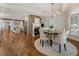 Bright dining area with hardwood floors and a charming chandelier at 315 Brandenburgh Cir, Roswell, GA 30075