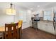 Well-equipped kitchen with white cabinets and granite counters at 315 Brandenburgh Cir, Roswell, GA 30075