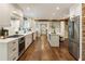 Spacious kitchen featuring stainless steel appliances and hardwood floors at 315 Brandenburgh Cir, Roswell, GA 30075