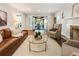 Living room with French doors leading to patio at 315 Brandenburgh Cir, Roswell, GA 30075