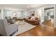 Living room with hardwood floors and kitchen view at 315 Brandenburgh Cir, Roswell, GA 30075