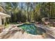 Inviting kidney-shaped pool and patio area at 315 Brandenburgh Cir, Roswell, GA 30075