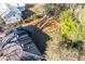 Aerial view of house and backyard with surrounding trees at 3542 N Druid Hill Rd, Decatur, GA 30033