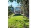 House with backyard, deck, and grassy area at 1103 Church Nw St, Atlanta, GA 30318