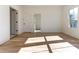 Hardwood floor bedroom with access to bathroom and another room at 1103 Church Nw St, Atlanta, GA 30318