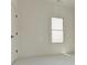 Bright bedroom featuring carpet and large window at 1103 Church Nw St, Atlanta, GA 30318