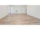 Spacious bedroom with light hardwood floors and access to exterior at 1103 Church Nw St, Atlanta, GA 30318