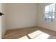 Bright bedroom with hardwood floors and window at 1103 Church Nw St, Atlanta, GA 30318