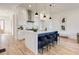 Modern kitchen with white cabinets, quartz countertops, and an island at 1101 Church Nw St, Atlanta, GA 30318