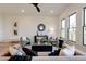 Open living room with hardwood floors, neutral decor, and a ceiling fan at 1103 Church Nw St, Atlanta, GA 30318