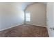 Spacious bedroom with neutral walls and carpet at 2411 Oakleaf Cir, Lithonia, GA 30058