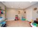 Fun playroom in the basement with toys and storage shelving at 4720 W Forest Peak Ne, Marietta, GA 30066