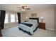 Cozy bedroom with ceiling fan and window coverings at 4720 W Forest Peak Ne, Marietta, GA 30066