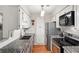 Bright kitchen with stainless steel appliances and granite countertops at 1214 Highland Bluff Se Dr # 214, Atlanta, GA 30339