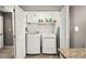 Neat laundry closet with full-size washer and dryer at 1214 Highland Bluff Se Dr # 214, Atlanta, GA 30339