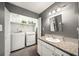 Convenient laundry area with washer and dryer in closet at 1214 Highland Bluff Se Dr # 214, Atlanta, GA 30339