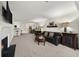 Comfortable living room with fireplace and view into dining area at 1214 Highland Bluff Se Dr # 214, Atlanta, GA 30339