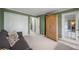 Bright office with a comfortable sofa and built-in shelves at 1214 Highland Bluff Se Dr # 214, Atlanta, GA 30339