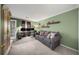 Cozy office space with built-in shelves and a comfortable couch at 1214 Highland Bluff Se Dr # 214, Atlanta, GA 30339