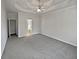 Main bedroom with carpet and access to the bathroom at 3561 Glen Summit Ln, Snellville, GA 30039