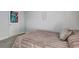 Bedroom featuring a comfortable bed with plush bedding and carpeted floors at 4233 Creekrun Cir, Buford, GA 30519