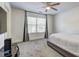 Cozy bedroom featuring neutral walls, plush carpet, and a ceiling fan for added comfort at 4233 Creekrun Cir, Buford, GA 30519
