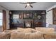Living room boasts a fireplace, floating shelves, and a rustic barn door at 4233 Creekrun Cir, Buford, GA 30519