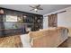Living room features a fireplace, built-in shelves, and a large sectional sofa at 4233 Creekrun Cir, Buford, GA 30519