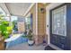 Inviting front porch featuring stylish decor and comfortable seating, perfect for relaxing outdoors at 4233 Creekrun Cir, Buford, GA 30519