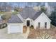 Charming single-Gathering home with white brick exterior and attached garage at 620 Oakledge Nw Dr, Marietta, GA 30060