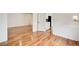 Living room featuring hardwood floors leading to the kitchen at 620 Oakledge Nw Dr, Marietta, GA 30060