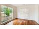 Living room featuring a large window and hardwood floors at 620 Oakledge Nw Dr, Marietta, GA 30060