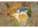 Stunning aerial view of a two-story home featuring a large lot, trampoline, and convenient driveway at 4492 Bryten Dr, Douglasville, GA 30135