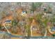Aerial view of homes nestled in a wooded neighborhood at 4492 Bryten Dr, Douglasville, GA 30135
