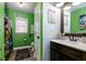 bathroom with a dinosaur theme and a single vanity at 4492 Bryten Dr, Douglasville, GA 30135