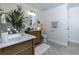 This bathroom features a single sink vanity with modern fixtures and a stone countertop at 4492 Bryten Dr, Douglasville, GA 30135