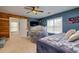 This bedroom has a large beanbag chair, a daybed with decorative pillows, and space-themed decor at 4492 Bryten Dr, Douglasville, GA 30135