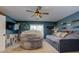 This bedroom has a large beanbag chair, a daybed with decorative pillows, and space-themed decor at 4492 Bryten Dr, Douglasville, GA 30135