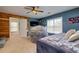 Bedroom with wood-paneled accent wall and a daybed at 4492 Bryten Dr, Douglasville, GA 30135