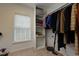 This closet boasts a window and built-in shelving for extra storage at 4492 Bryten Dr, Douglasville, GA 30135